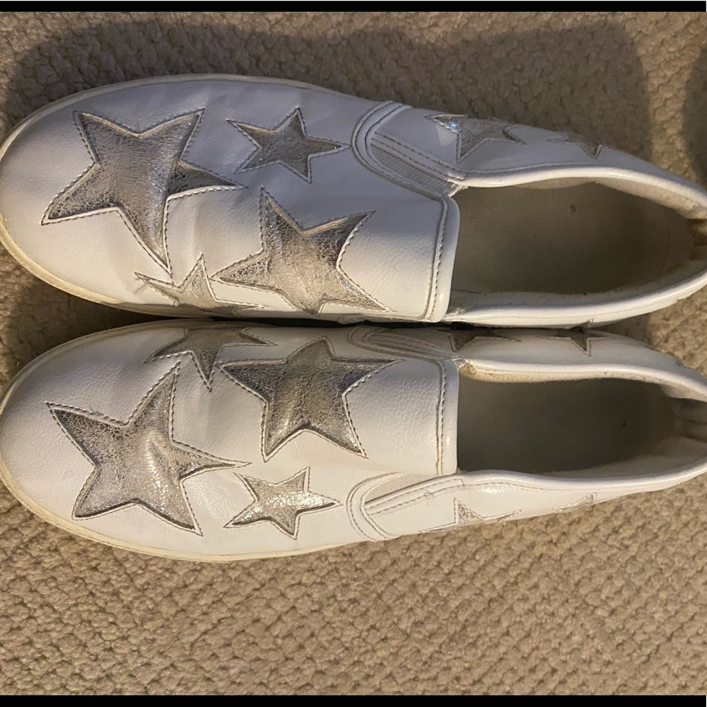 White and silver starred slip on sneakers
